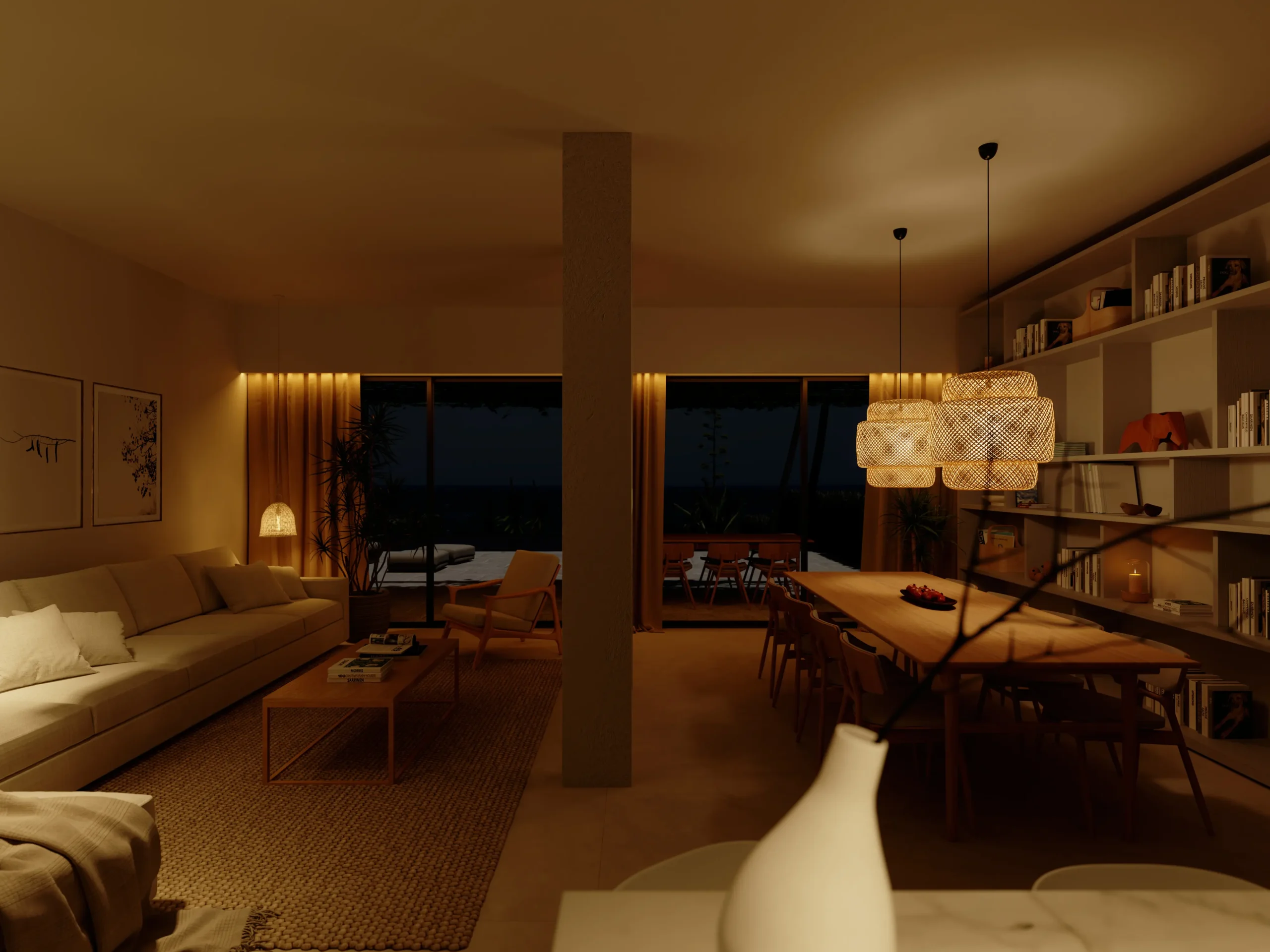 Warmly lit living and dining room at night, featuring a long wooden table, woven pendant lights, a cushioned sofa, and a bookshelf with accent lighting.
