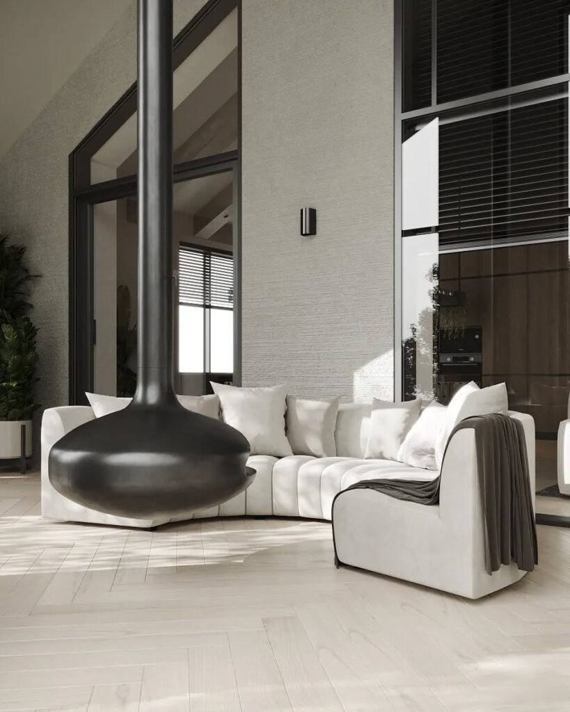 Modern living room with a curved white sectional sofa and a dramatic suspended black fireplace, featuring large glass doors and minimalist decor.